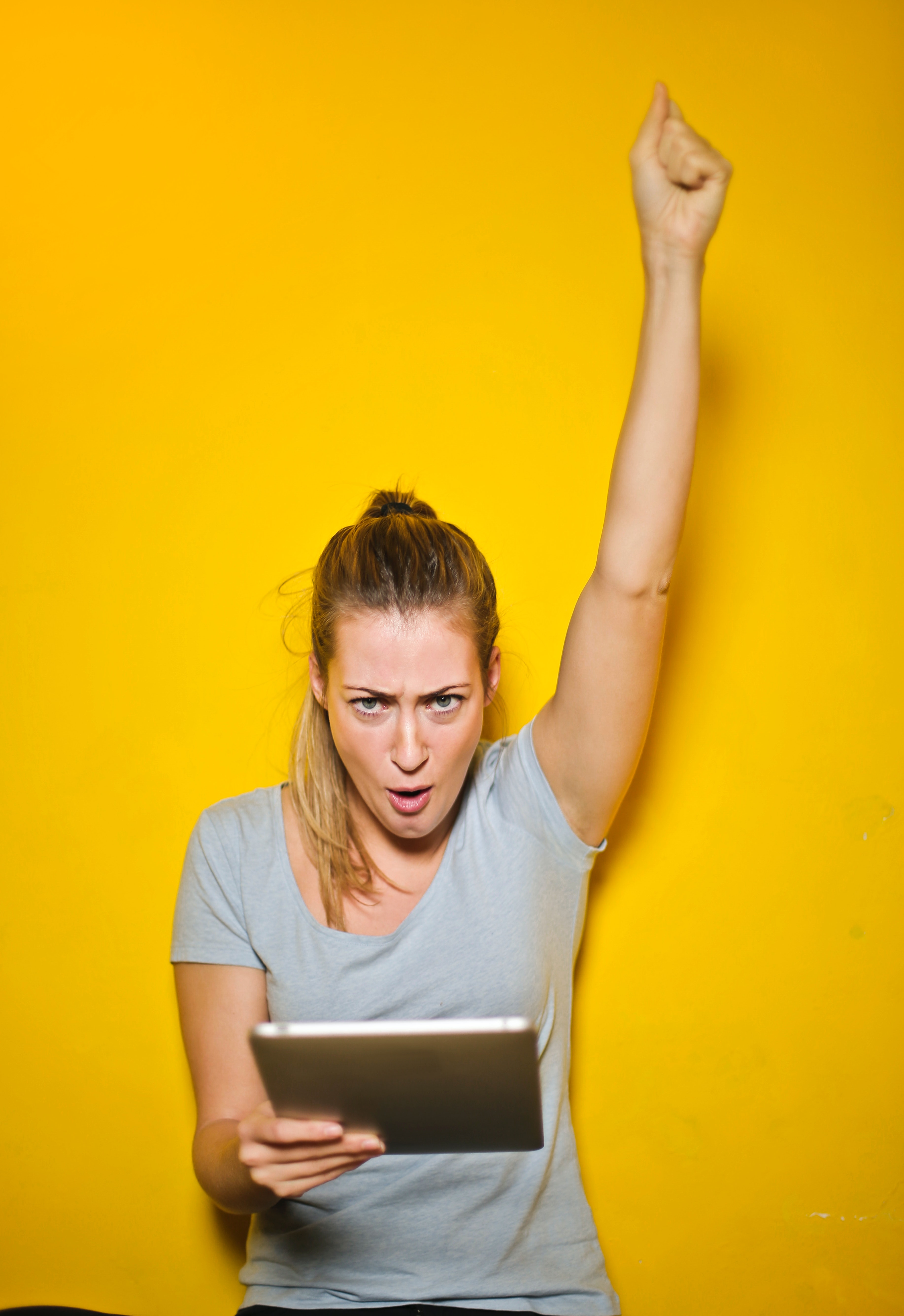 photo-of-a-woman-holding-an-ipad-761977